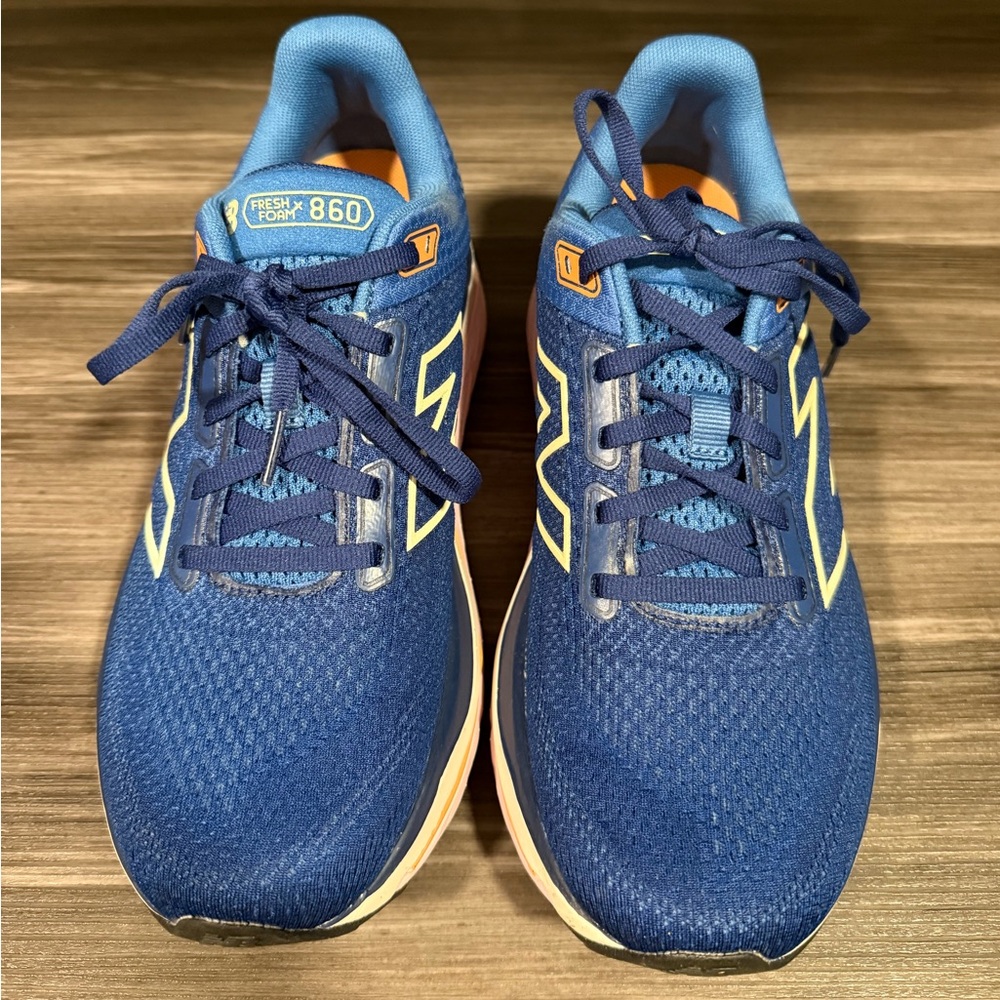 New Balance 860 Fresh Foam. Blue Athletic Sneakers with Orange Accents